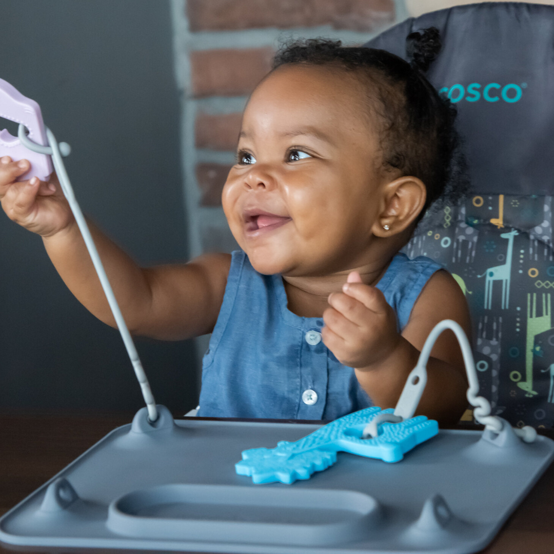 Alfombra de silicona de bebé ocupada con correas de juguete