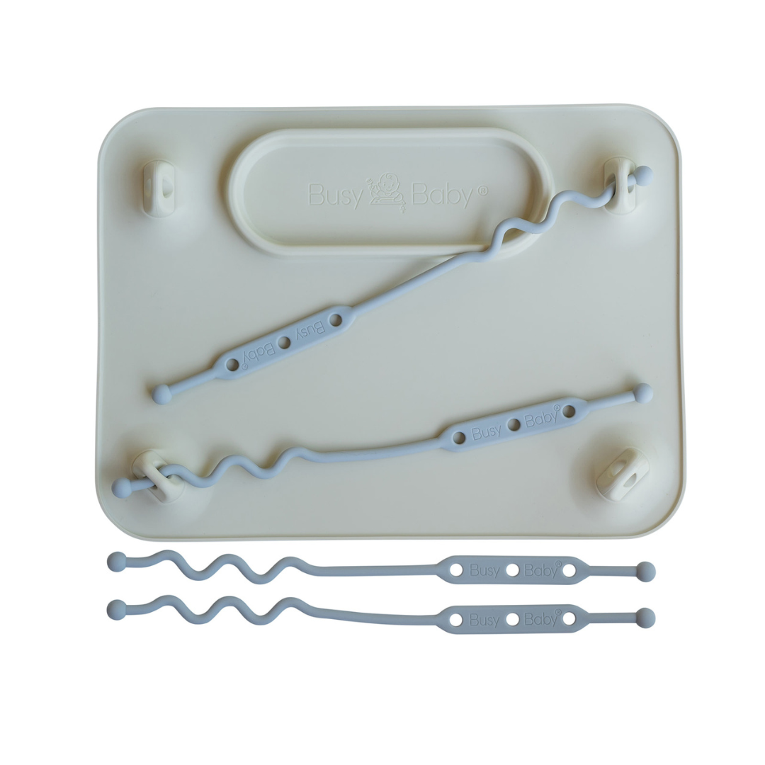 Alfombra de silicona de bebé ocupada con correas de juguete