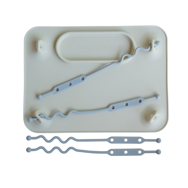 Alfombra de silicona de bebé ocupada con correas de juguete