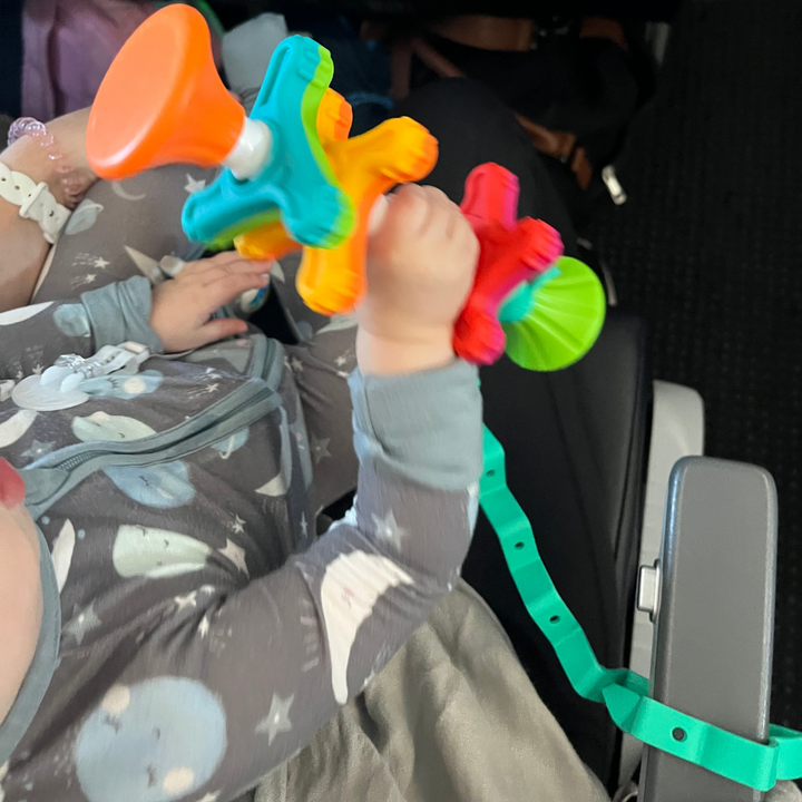 Toy de bebé ocupado Bungee & Tether